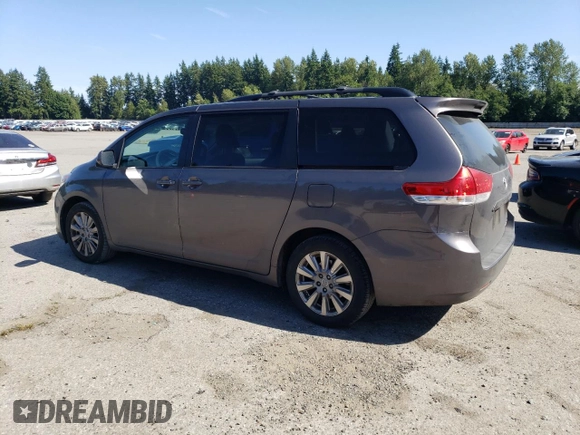2012 Toyota Sienna XLE with VIN 5TDDK3DC5CS036642, listed as a Copart auction lot 60503325 with 199,097 mi miles and Clean title. Bid and sale history available at DreamBid. Image 2.