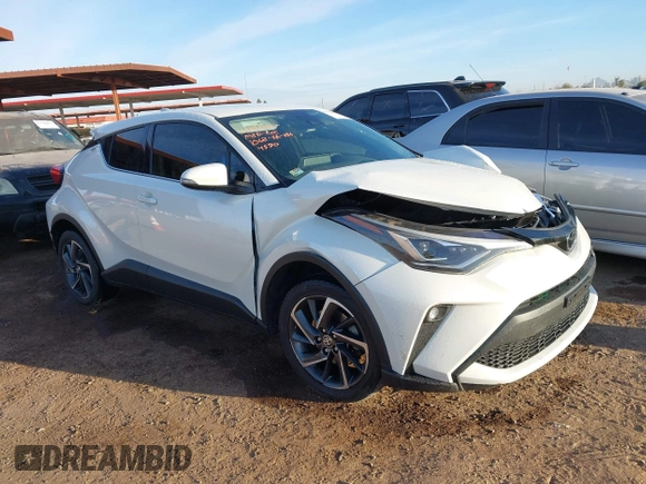 2021 Toyota C-HR LE with VIN JTNKHMBX3M1114590, listed as a IAAI auction lot 41560459 with 61,803 mi miles. Bid and sale history available at carsss.com. Image 1.