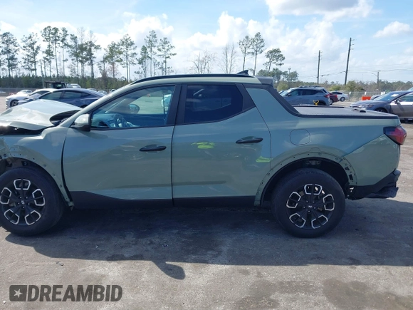 2023 Hyundai Santa Cruz SEL with VIN 5NTJC4AE3PH062553, listed as a IAAI auction lot 41712737 with 47,363 mi miles and . Bid and sale history available at DreamBid. Image 14.