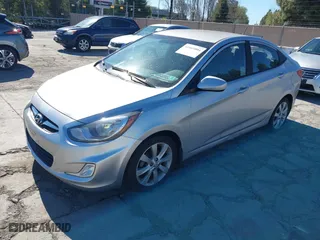 2013 Hyundai Accent GLS with VIN KMHCU4AE2DU429055, listed as a IAAI auction lot 41869804 with 126,094 mi miles. Bid and sale history available at carsss.com. Image 2.
