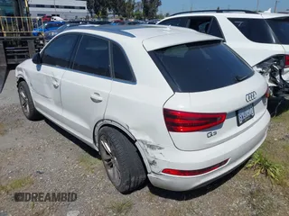 2015 Audi Q3 2.0T Premium Plus with VIN WA1EFCFS9FR002651, listed as a IAAI auction lot 41755613 with 111,281 mi miles. Bid and sale history available at carsss.com. Image 3.