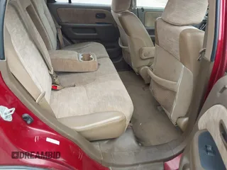 2002 Honda CR-V LX z VIN JHLRD78492C058964, wystawiony jako IAAI lot #42450208 z przebiegiem Nie podano mil oraz . Historia ofert i sprzedaży dostępna na DreamBid. Obrazek 8.
