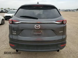 2021 Mazda CX-9 Touring z VIN JM3TCACY1M0502783, wystawiony jako Copart lot #53551935 z przebiegiem 71 373 mil mil oraz Czysty tytuł • Clean title. Historia ofert i sprzedaży dostępna na DreamBid. Obrazek 6.