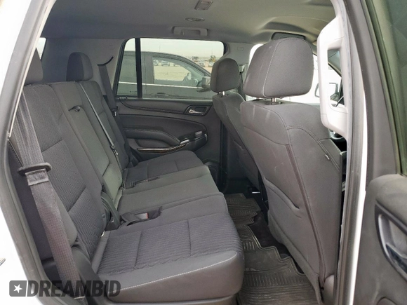 2018 Chevrolet Tahoe LS z VIN 1GNSKAKC4JR149743, wystawiony jako Copart lot #50081815 z przebiegiem 52 005 mil mil oraz Szkoda całkowita • Salvage title. Historia ofert i sprzedaży dostępna na DreamBid. Obrazek 11.