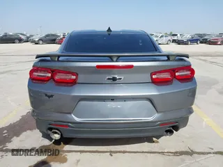 2021 Chevrolet Camaro 1LT z VIN 1G1FB1RX9M0125698, wystawiony jako IAAI lot #41824653 z przebiegiem 69 365 mil mil oraz . Historia ofert i sprzedaży dostępna na DreamBid. Obrazek 17.