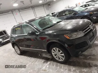 2013 Volkswagen Touareg Exec с VIN WVGEF9BP9DD004013, выставлен на аукционе IAAI как лот 41644882 с пробегом 148 096 миль миль и . История ставок и продаж доступна на DreamBid. Изображение 13.