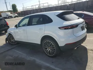 2021 Porsche Cayenne with VIN WP1AA2AYXMDA00148, listed as a Copart auction lot 52647565 with 27,977 mi miles and Salvage title. Bid and sale history available at DreamBid. Image 2.