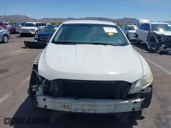 2011 Ford Taurus SE with VIN 1FAHP2DW1BG165371, listed as a IAAI auction lot 42164608 with 186,485 mi miles. Bid and sale history available at carsss.com. Image 13.