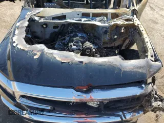 2019 Ram 1500 Big Horn z VIN 1C6SRFFT4KN794615, wystawiony jako Copart lot #62704435 z przebiegiem Nie podano mil oraz Szkoda całkowita • Salvage title. Historia ofert i sprzedaży dostępna na DreamBid. Obrazek 11.