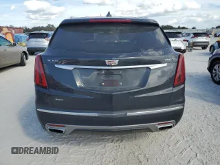 2023 Cadillac XT5 AWD Premium Luxury with VIN 1GYKNDR4XPZ153623, listed as a Copart auction lot 77071324 with 26,292 mi miles and Non Repairable. Bid and sale history available at DreamBid. Image 6.