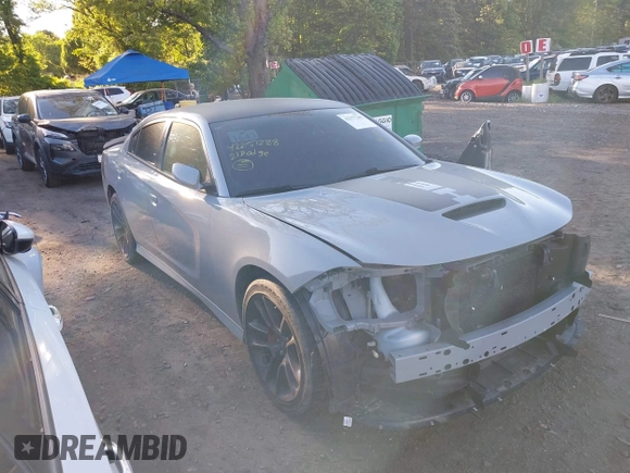 2021 Dodge Charger R/T with VIN 2C3CDXCT8MH594715, listed as a IAAI auction lot 42257288 with 11,570 mi miles and . Bid and sale history available at DreamBid. Image 13.
