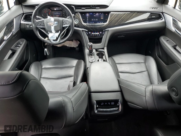 2020 Cadillac XT6 FWD Premium Luxury with VIN 1GYKPCRSXLZ154638, listed as a Copart auction lot 57439835 with 142,435 mi miles and Salvage title. Bid and sale history available at DreamBid. Image 8.
