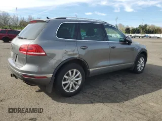 2016 Volkswagen Touareg Sport с VIN WVGEF9BPXGD007023, выставлен на аукционе Copart как лот 50760865 с пробегом 96 657 миль миль и Списание • Salvage title. История ставок и продаж доступна на DreamBid. Изображение 3.