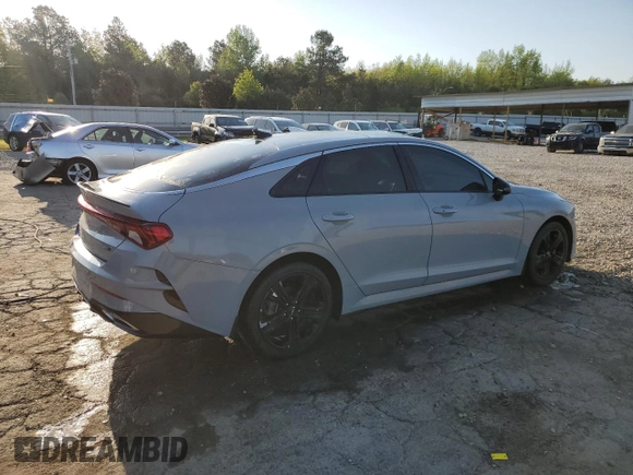 2022 Kia K5 GT-Line z VIN 5XXG64J23NG117047, wystawiony jako Copart lot #52318315 z przebiegiem 25 074 mil mil oraz Szkoda całkowita • Salvage title. Historia ofert i sprzedaży dostępna na DreamBid. Obrazek 3.