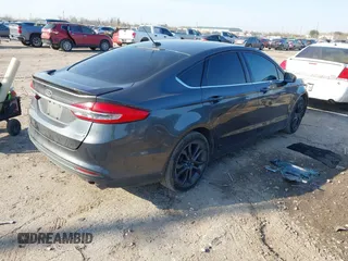 2018 Ford Fusion SE with VIN 3FA6P0HD0JR158536, listed as a IAAI auction lot 41695179 with 114,815 mi miles. Bid and sale history available at carsss.com. Image 4.