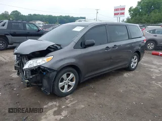 2014 Toyota Sienna L with VIN 5TDZK3DC5ES439593, listed as a IAAI auction lot 42420219 with 136,544 mi miles and . Bid and sale history available at DreamBid. Image 18.