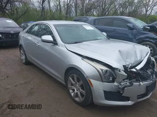 2014 Cadillac ATS Standard RWD z VIN 1G6AA5RA1E0177452, wystawiony jako IAAI lot #39138915 z przebiegiem 134 473 mil mil oraz . Historia ofert i sprzedaży dostępna na DreamBid. Obrazek 1.