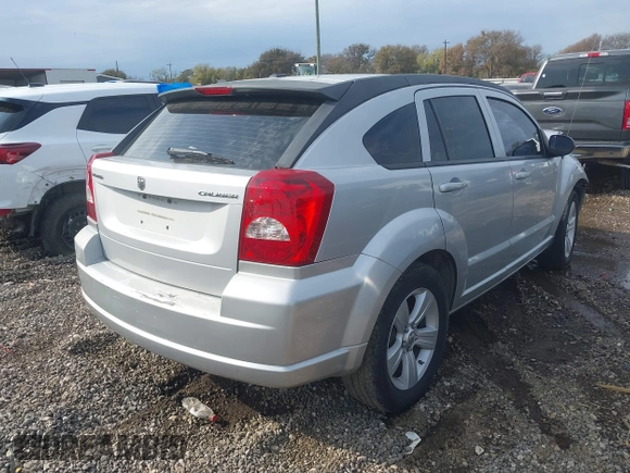 2011 Dodge Caliber Mainstreet with VIN 1B3CB3HA7BD168429, listed as a IAAI auction lot 41035025 with 155,614 mi miles and . Bid and sale history available at DreamBid. Image 4.