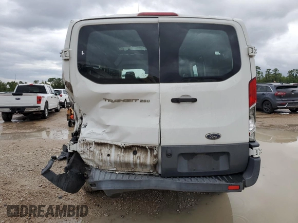 2016 Ford Transit Cargo with VIN 1FTYR1ZM8GKA89853, listed as a Copart auction lot 69234554 with 200,049 mi miles and Salvage Title. Bid and sale history available at DreamBid. Image 6.