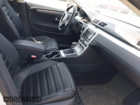 2013 Volkswagen CC Sport with VIN WVWBP7AN0DE523261, listed as a IAAI auction lot 42106039 with 136,105 mi miles. Bid and sale history available at carsss.com. Image 5.