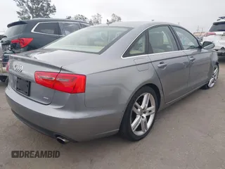 2015 Audi A6 Premium Plus z VIN WAUGFAFC6FN009203, wystawiony jako IAAI lot #42242726 z przebiegiem 69 163 mil mil oraz . Historia ofert i sprzedaży dostępna na DreamBid. Obrazek 4.