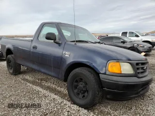 2004 Ford F-150 XL with VIN 2FTPF17Z44CA67318, listed as a Copart auction lot 84940644 with 87,057 mi miles and Salvage title. Bid and sale history available at DreamBid. Image 4.