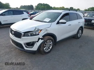 2017 Kia Sorento LX with VIN 5XYPG4A35HG205801, listed as a IAAI auction lot 42143064 with 129,647 mi miles. Bid and sale history available at carsss.com. Image 17.