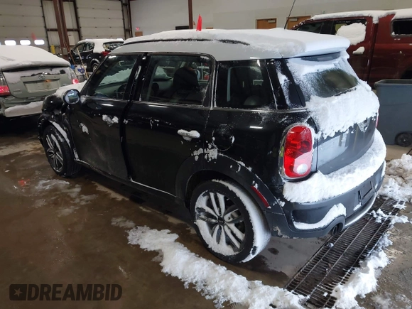 2014 MINI Countryman S with VIN WMWZC5C57EWP39161, listed as a IAAI auction lot 41342912 with 108,459 mi miles and . Bid and sale history available at DreamBid. Image 3.