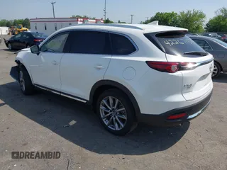 2021 Mazda CX-9 Grand Touring z VIN JM3TCBDY8M0537986, wystawiony jako IAAI lot #42267157 z przebiegiem 25 375 mil mil oraz . Historia ofert i sprzedaży dostępna na DreamBid. Obrazek 3.