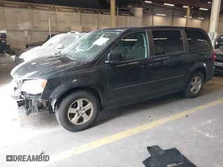 2013 Dodge Grand Caravan SXT with VIN 2C4RDGCG7DR523945, listed as a IAAI auction lot 41730286 with 140,749 mi miles. Bid and sale history available at carsss.com. Image 18.