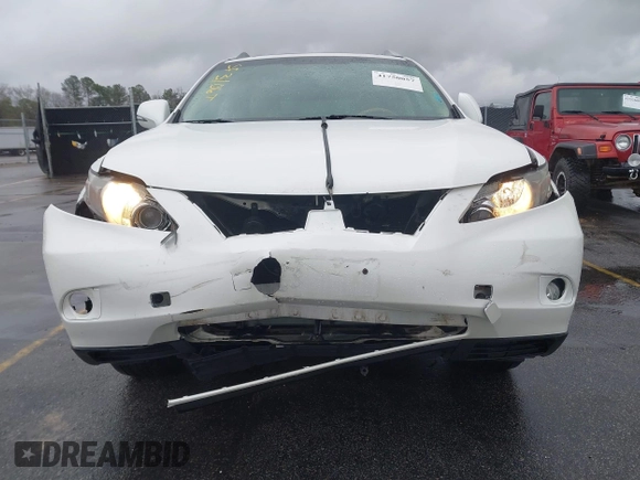 2010 Lexus RX with VIN 2T2BK1BA1AC042713, listed as a IAAI auction lot 41750057 with 193,495 mi miles. Bid and sale history available at carsss.com. Image 6.