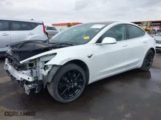 2020 Tesla Model 3 Standard Range Plus with VIN 5YJ3E1EA6LF613512, listed as a IAAI auction lot 41442986 with 53,109 mi miles. Bid and sale history available at carsss.com. Image 20.