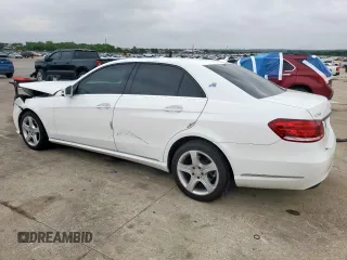 2014 Mercedes-Benz E 350 Sport with VIN WDDHF5KB8EA853525, listed as a Copart auction lot 55132715 with 125,895 mi miles and Salvage title. Bid and sale history available at DreamBid. Image 2.