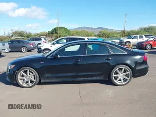 2015 Audi A6 Premium Plus with VIN WAUFGAFCXFN003171, listed as a IAAI auction lot 41262612 with 70,126 mi miles and . Bid and sale history available at DreamBid. Image 14.