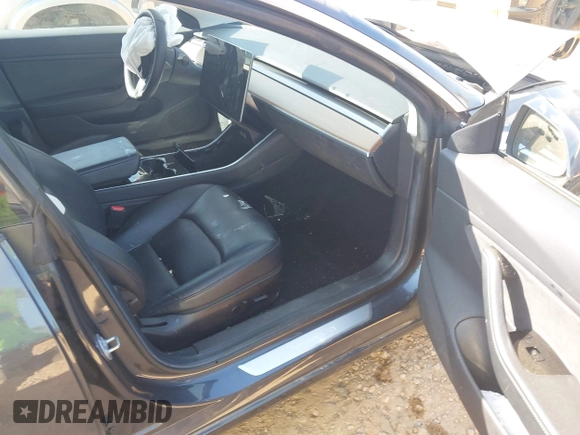 2019 Tesla Model 3 Long Range with VIN 5YJ3E1EB2KF510398, listed as a IAAI auction lot 42067654 with 108,971 mi miles and . Bid and sale history available at DreamBid. Image 5.