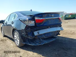 2015 Lexus ES 300h z VIN JTHBW1GG9F2091927, wystawiony jako IAAI lot #41933816 z przebiegiem 122 934 mil mil oraz . Historia ofert i sprzedaży dostępna na DreamBid. Obrazek 6.