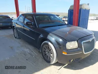 2009 Chrysler 300 Touring with VIN 2C3KA53V59H621936, listed as a IAAI auction lot 42112314 with 198,461 mi miles. Bid and sale history available at carsss.com. Image 1.