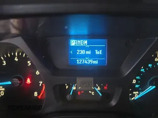 2016 Ford Transit Cargo z VIN 1FTYE1YM9GKB18600, wystawiony jako IAAI lot #42726792 z przebiegiem 127 434 mil mil oraz . Historia ofert i sprzedaży dostępna na DreamBid. Obrazek 22.