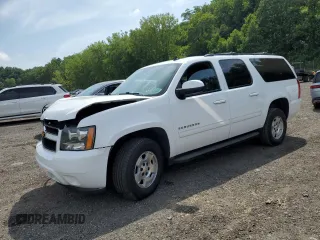 2014 Chevrolet Suburban LT with VIN 1GNSKJE70ER228489, listed as a Copart auction lot 64465575 with 142,089 mi miles and Salvage title. Bid and sale history available at DreamBid. Image 1.