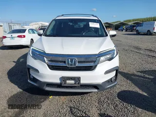 2021 Honda Pilot Touring 8-Passenger with VIN 5FNYF6H92MB031782, listed as a IAAI auction lot 42087322 with 70,062 mi miles and . Bid and sale history available at DreamBid. Image 12.