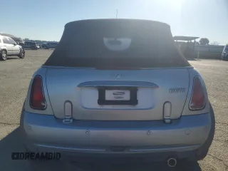 2005 MINI Convertible with VIN WMWRF33465TG10044, listed as a Copart auction lot 50364235 with 152,186 mi miles and Salvage title. Bid and sale history available at DreamBid. Image 6.