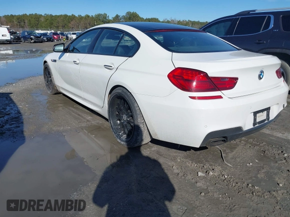 2013 BMW 6 Series 650i xDrive with VIN WBA6B4C59DD098329, listed as a IAAI auction lot 41404788 with 139,677 mi miles. Bid and sale history available at carsss.com. Image 3.