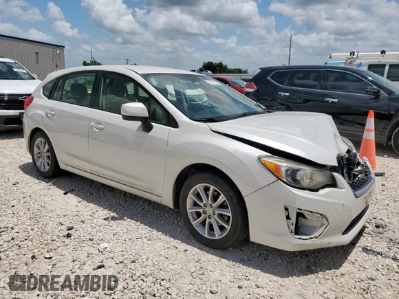 2012 Subaru Impreza Premium with VIN JF1GPAC68CG231570, listed as a Copart auction lot 62942705 with 115,833 mi miles and Salvage title. Bid and sale history available at DreamBid. Image 4.