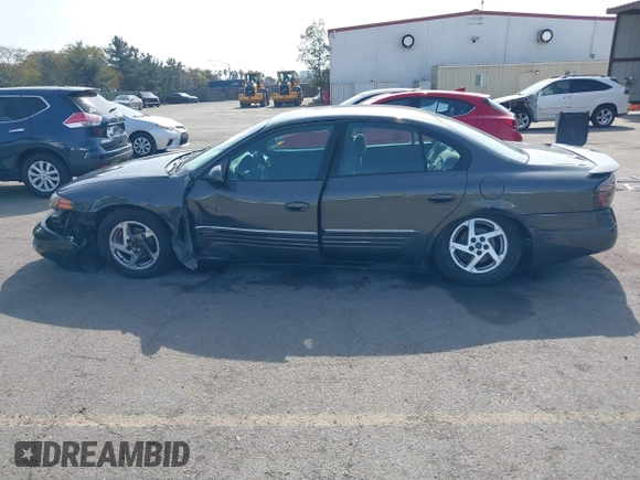 2003 Pontiac Bonneville SE z VIN 1G2HX52K934181238, wystawiony jako IAAI lot #41483636 z przebiegiem 176 737 mil mil oraz . Historia ofert i sprzedaży dostępna na DreamBid. Obrazek 14.