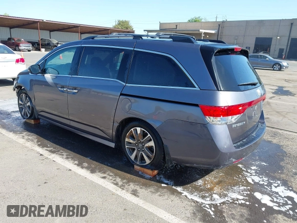 2015 Honda Odyssey Touring Elite с VIN 5FNRL5H93FB056183, выставлен на аукционе IAAI как лот 42073205 с пробегом 119 874 миль миль и . История ставок и продаж доступна на DreamBid. Изображение 3.
