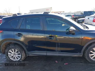 2016 Mazda CX-5 Sport with VIN JM3KE4BY0G0662294, listed as a IAAI auction lot 41469721 with 127,116 mi miles and . Bid and sale history available at carsss.com. Image 13.