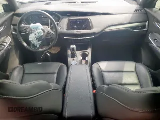 2019 Cadillac XT4 FWD Premium Luxury with VIN 1GYFZCR47KF175802, listed as a Copart auction lot 57153785 with 33,308 mi miles and Salvage title. Bid and sale history available at DreamBid. Image 8.