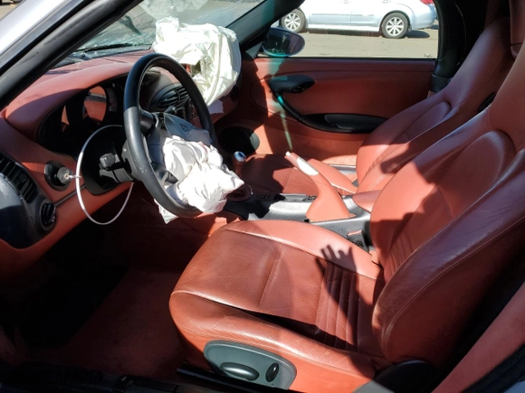 1997 Porsche Boxster with VIN WP0CA2984VS623325, listed as a Copart auction lot 80672534 with 71,725 mi miles and Salvage Title. Bid and sale history available at carsss.com. Image 7.