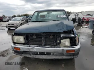 1994 Toyota T100 DX with VIN JT4VD10A6R0017701, listed as a Copart auction lot 46034975 with 219,651 mi miles and Salvage Title. Bid and sale history available at DreamBid. Image 5.
