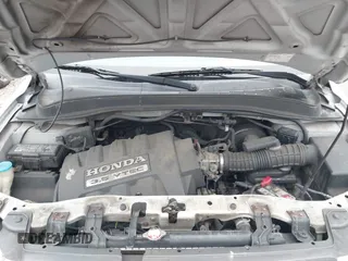 2005 Honda Pilot EX-L with RES with VIN 5FNYF186X5B062577, listed as a IAAI auction lot 42018093 with 209,321 mi miles. Bid and sale history available at carsss.com. Image 10.